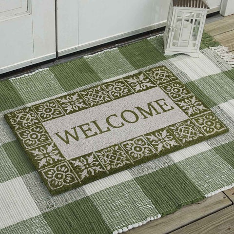 Our Peaceful Cottage Doormat will liven up your entryway and add warm welcome to your home.  Features a variety tile stamped boarder with the word Welcome.