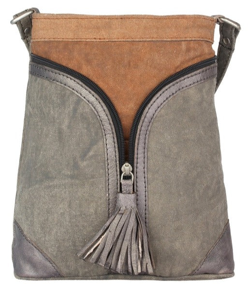 Simply styled for the commuter on the go, this functional and roomy crossbody bag travels easily with and roomy front compartment has enough space to organize all of your necessities.