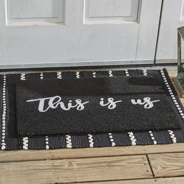 Our Fairfield This Is Us Doormat will liven up your entryway and add warm welcome to your home.  Features a black background and white letters reading This is Us.