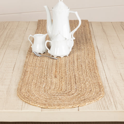 The Natural Jute Runner includes one table runner measuring 13x90 inches made from a premium Jute fiber. The rich texture of braided jute brings a timeless look to your country decor with its warm, golden tan color. 