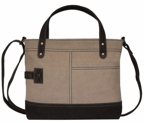 A versatile style that can be paired with any look, you'll reach for this crossbody every chance you get. Carry it as a handbag or as a crossbody for hands-free fun with an  Made from durable re-milled and up-cycled military tarps & tents used by the army, covering trucks as tarps and providing shelter as tents, this textile is given new life. The Mona B canvas collection is part of a global initiative committed to up-cycling, re-milling and zero-waste manufacturing.