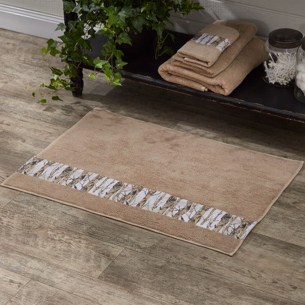 Add beautiful outdoorsy style to your bathroom with the Birch Forest Bath Mat! The warm tones will complement country decor perfectly! Coordinate with the complementary Birch Forest fingertip towels, hand towels, and bath towels for a complete look!