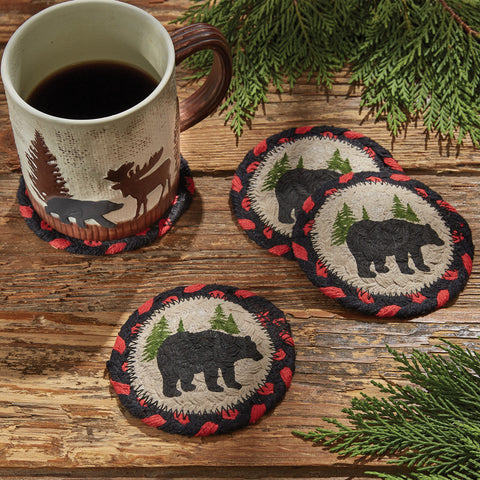 The Black Bear Braided Coasters measures 4" in diameter and is perfect for adding the great outdoors to any room in the home. Featuring a black bear and pine trees surrounded by a red and black boarded, these coasters will blend easily with your cabin, country or rustic decor. Made from 100% premium cotton which is a brilliant insulator making it a perfect tool to protect your tables.