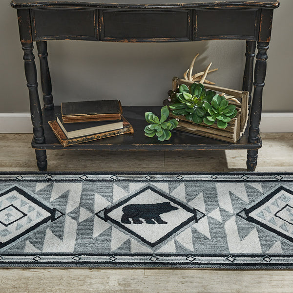 Add a charming and stylish feel to your home with this cute Tribal Hooked Rug Runner! The tribal pattern with a black bear silhouette rug is more than fun ... It's a great way to keep your feet warm and your floors clean! Perfect for your rustic cabin home! Add to your style with the Tribal Hooked Stool!