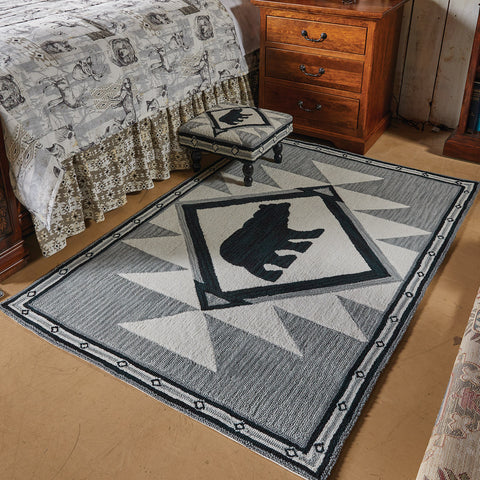 Add a charming and stylish feel to your home with this cute Tribal Hooked Rug! The tribal pattern with a black bear silhouette rug is more than fun ... It's a great way to keep your feet warm and your floors clean! Perfect for your rustic cabin home! Add to your style with the Tribal Hooked Stool!