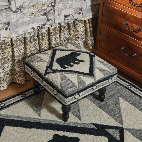 This stunning Tribal Hooked Stool is truly a work of art! The beautiful piece features an intricate tribal print with black bear silhouette design that will liven up any room!