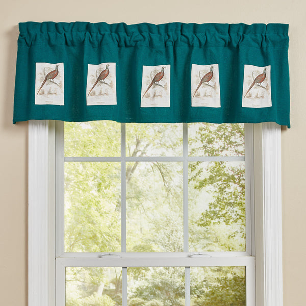 The Pheasant Run Lined Patch Valance adds a charming touch to your country kitchen! Featuring a charming bird perched on a branch in the wilderness, this valance will be a stylish accent to your decor! Coordinate with the matching Pheasant Run Dishtowels and Pheasant Run Patch Table Runner!