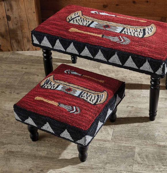 This stunning Wilderness Canoe Hooked Stool is truly a work of art! The beautiful piece features an intricate canoe and paddle design and pops of color that will liven up any room!