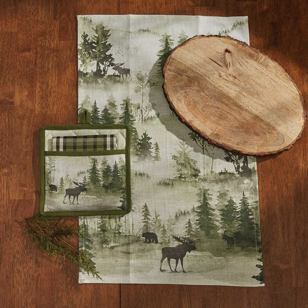 This Watercolor Wildlife Dishtowel offers a beautiful outdoorsy appeal! Featuring a muted blend of grays and greens that work together to create a scene of animals in their natural habitats, these dishtowels are sure to bring the rugged outdoors in! Pair with the coordinating pillow, doormat, valance, table runner, and napkins for a complete look!