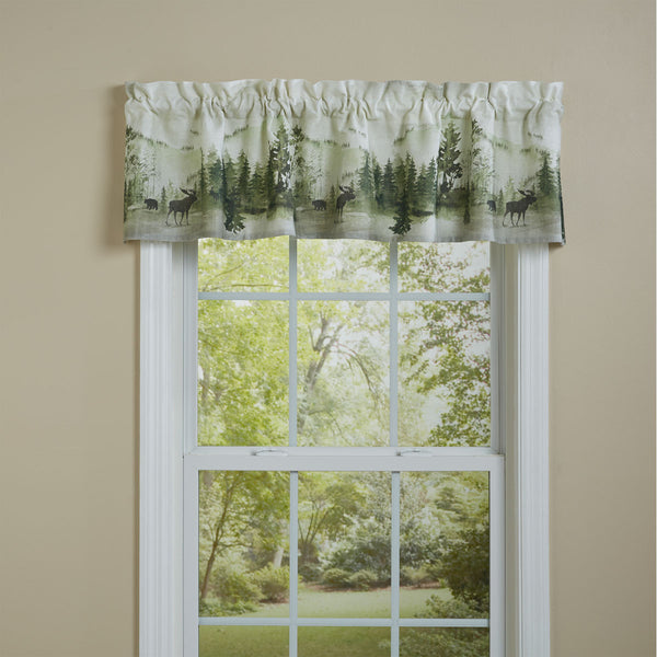 This Watercolor Wildlife Valance offers a beautiful outdoorsy appeal! Featuring a muted blend of grays and greens that work together to create a scene of animals in their natural habitats, this valance is sure to bring the rugged outdoors in! 