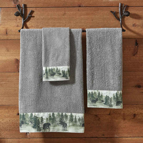 This Watercolor Wildlife Bath Towel offers a beautiful outdoorsy appeal! Featuring a muted blend of grays and greens that work together to create a scene of animals in their natural habitats, this bath towel is sure to bring the rugged outdoors in! Pair with the coordinating pillow, hand towel, valance, and finger tip towels for a complete look!