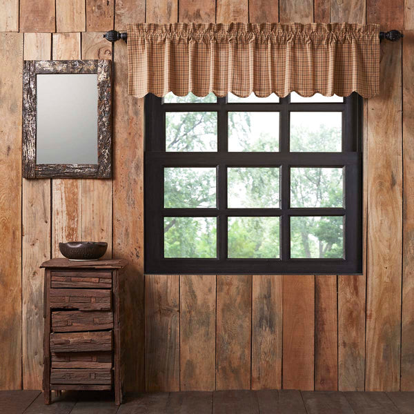 Finish your windows in rustic country elegance with the Millsboro Scalloped Valance. Featuring burgundy, navy, and tan plaid with scalloped edges to add understated class, our 16x72 curtain brings cozy warmth to your lodge, lake house, cottage, or cabin decor.