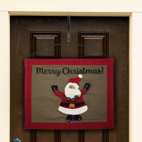 Primitive Christmas pennant featuring a wool appliqué Santa with jingle bells and Merry Christmas embroidery on a neutral background with a red border.