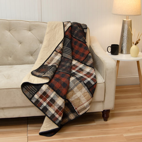 Lj Plaid Throw, The rich color palette of deep rusty red, tan, ivory, and rich dark brown, complemented by touches of classic black, creates a warm and inviting atmosphere in any bedroom.