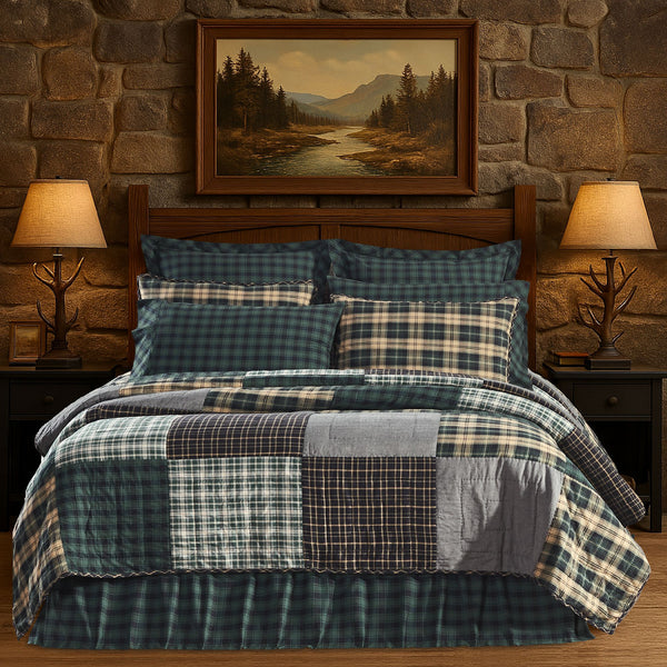 Pine Grove Queen Quilt 90x90 featuring pine green, black, tan, and grey plaid patchwork in a rustic lodge bedroom setting.