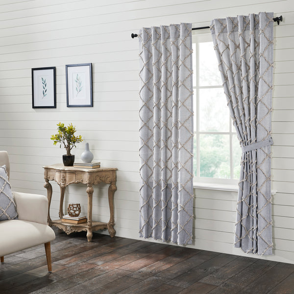 Elevate the look of your living room with modern farmhouse style curtains. This 84x40 Frayed Lattice Creme & Black Panel Set of 2 features a soft white cotton lining and classic denim grey, soft black, and cream hues. The textured, tufted weave features a clean geometric pattern