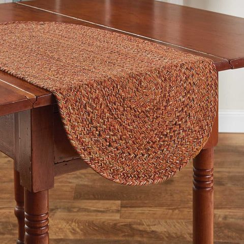 A beautiful blend of fall colors are used to create the Allspice Braided Table Runner.  Colors: Pumpkin, Brownstone & Farmhouse Tan