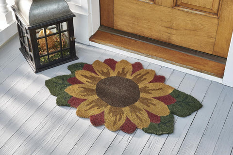 Our Sunflower Doormat features a giant sunflower cut out to welcome your guests.