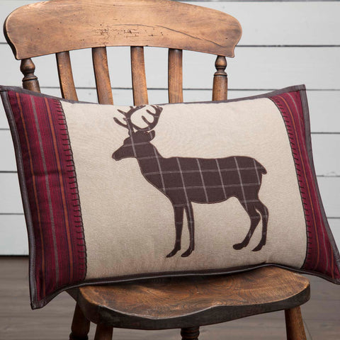 The Wyatt Deer Applique Pillow Cover is proud of its rustic roots with its textured khaki chambray base with a centered espresso and white windowpane appliqued deer. Both the left and right appliqued panels are crimson striped with espresso brown whip stitching and finished with real brown leather piping trimmed around the outside edge. Reverses to solid khaki chambray and 2 tie closures.