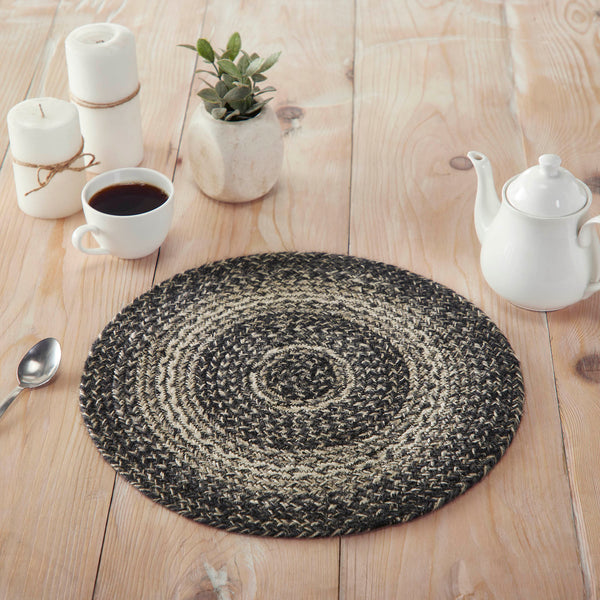  The Sawyer Mill Black White Jute Trivet includes an individual circular trivet with a 15-inch diameter made from a premium Jute blend. The rich texture of braided jute is given a modern twist with black, grey and creme colors for a neutral modern country style. 