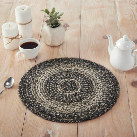  The Sawyer Mill Black White Jute Trivet includes an individual circular trivet with a 15-inch diameter made from a premium Jute blend. The rich texture of braided jute is given a modern twist with black, grey and creme colors for a neutral modern country style. 
