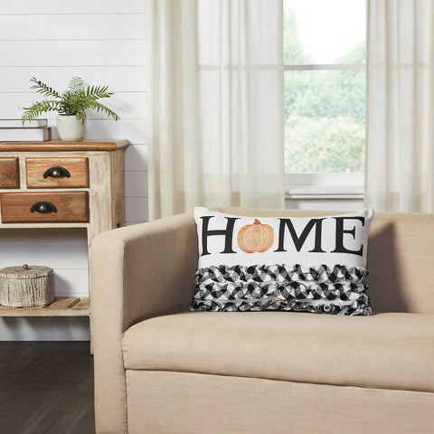 Add a pop of fun fall style with this rectangular accent pillow. The Annie Black Check Home Ruffle Pumpkin Pillow measures 14 by 22 inches. The filled pillow features word art reading, Home with a fun pumpkin detail in burnt orange. Ruching along the bottom of pillow produces a feminine ruffled look.