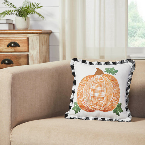 Add a burst of classic fall style with this ruffled accent pillow. The Annie Black Check Pumpkin Pillow measures 12 by 12 inches and includes a ruffled edging. The filled pillow features a large orange pumpkin surrounded by leaf accents.