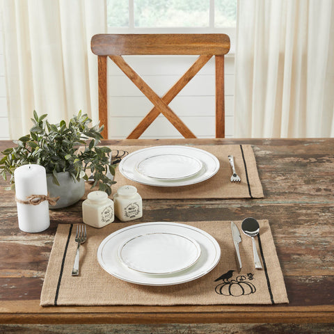  The Raven Harvest Burlap Jute Placemat Set includes two placemats measuring 13x19 inches each. The table place settings are constructed with a texture-rich burlap in natural tan. A small design in the lower right of a pumpkin and raven adds a soft dose of seasonal charm. 