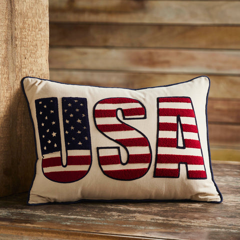 Elevate your home decor with the VHC Brands Patriotic USA Pillow, a captivating 14x20 cotton accent that embodies the essence of Independence Day. This rectangular pillow features an intricately embroidered Stars and Stripes Flag design, adding a patriotic touch to your bedroom, entryway, or living room. The natural cotton fabric offers a soft and inviting texture, making it an ideal choice for both comfort and style in any Americana-themed setting. 