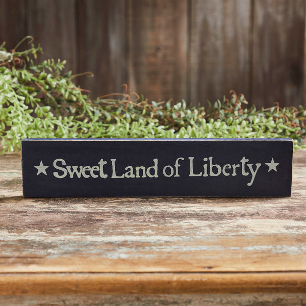 <p data-mce-fragment="1">Elevate your Independence Day Decor with the VHC Brands Sweet Land Of Liberty Blue Wooden Sign, a charming addition to your home measuring 2.75x13 inches. Crafted from printed tropical wood in a soothing faded blue shade, this rectangular sign seamlessly integrates with Americana decor, creating a patriotic focal point. The sign features the inspiring text "Sweet Land of Liberty," elegantly printed to evoke a sense of national pride.</p> <p data-mce-fragment="1">&nbsp;</p>