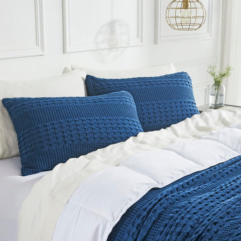 Bring cozy farmhouse charm to your bedroom with the Waffle Weave Navy Blue Queen Sham Set. Includes 2 pre-washed cotton shams (20x30) with textured waffle weave design.