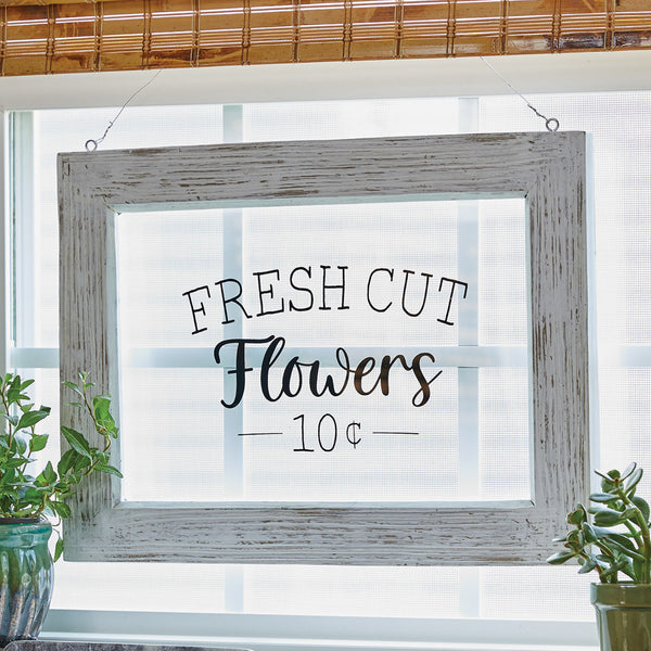 You can add a subtle touch of spring charm to any room with our Fresh Cut Flowers Hanging Sign. This sign features a distressed frame with a simple design and is sized to work well in a variety of locations. Hang this wall sign near a flower display or use it to add a pretty touch to a spring wall gallery display.