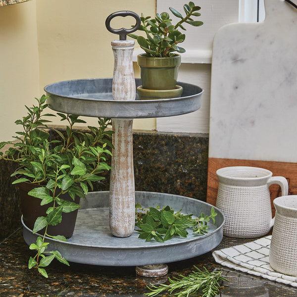 The Vintage 2 Tier Organizer  is ideal to add to your farmhouse decor! Stylish and functional! Coordinate with the complementary napkin holder and salt & pepper shaker, bread box, and canisters for a complete look!