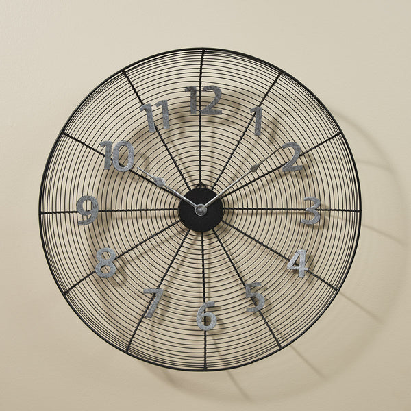 Perfect for the country farmhouse decor, this Wire Fan Cover Clock will fit with any color scheme! Pretty and fun! This exclusively designed wall clock Measures 20" x 20", and is perfect for adding design and depth to your wall