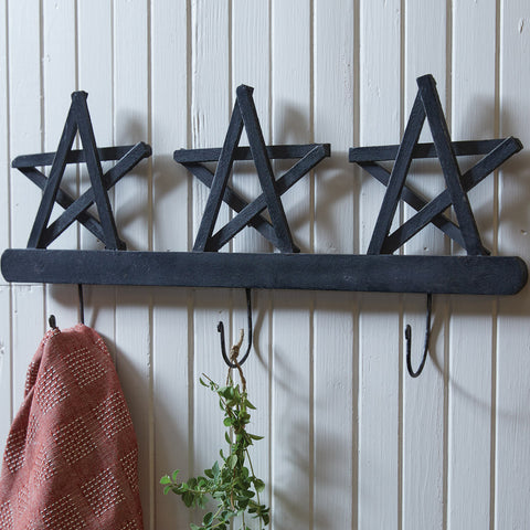 The Tobacco Star Triple Hook  adds a warm touch of country charm to any decor!