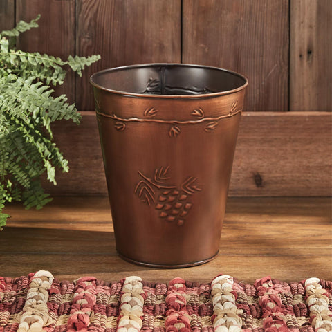 The Valley Pine Waste Basket is a gorgeous rustic touch to any bathroom! Beautiful and functional! This waste basket is far too charming to hide away in the corner! Textured patterns of pine needles and pine cones in copper on tin.