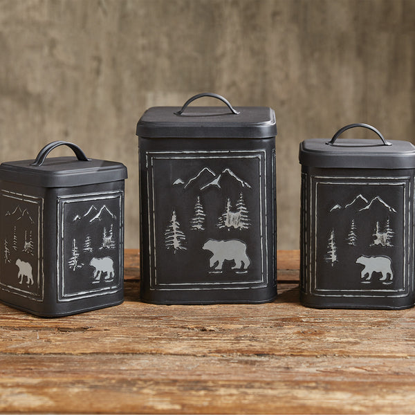 Featuring beautiful wildlife scenes, the Black Bear Canisters are a great way to bring a touch of the outdoors to your table or anywhere in your home! Great for indoors or outdoors! Add to this rustic look with the Black Bear Lampshade and Waste Basket!