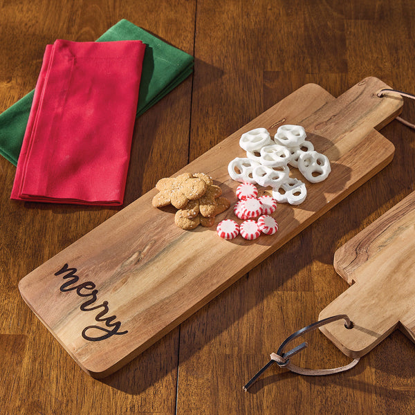 Add a functional and stylish touch to your festive kitchen decor with the Merry Cutting Board! Featuring a long solid wood rectangle board with "Merry" engraved across the bottom. This cutting board will be a functional and beautiful accent in your holiday kitchen!