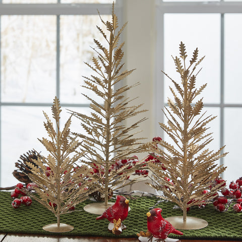 Gold Metal Trees - Small, Accent your Christmas decor with the beautiful Small Gold Metal Tree! Perfect way to fill in that empty spot ... An instant touch of festive style! Also available in medium and large sizes (as pictured / sold separately).