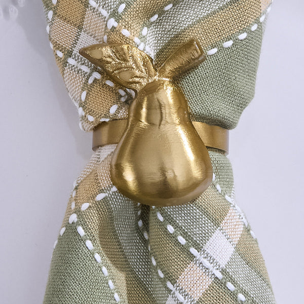 Set of 6 golden pear napkin rings from Park Designs. Each ring is approx. 2" x 2" with a warm metallic finish—perfect for everyday and holiday tables.