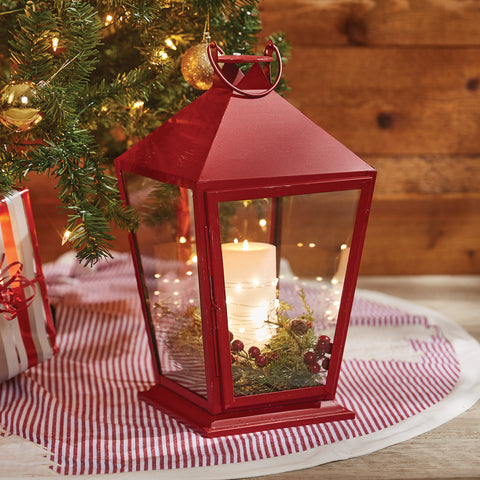 Our Tall Square Red Lantern will be a vibrant addition to your festive decor. Use as a centerpiece for rustic ambient lighting. Featuring a hook on top, 4 glass sides, and a square base.  DIMENSIONS: 17"H X 9.25"W X 8.75"D