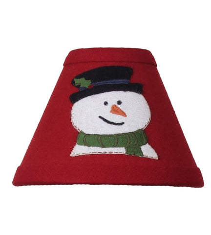 Flurry Snowman Lampshade in rich red fabric featuring a snowman applique displayed on a candle lamp for primitive Christmas decorating.