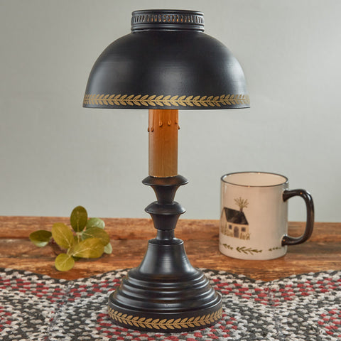Add a stylish touch to any room with the Black Tole Accent Lamp! Featuring a black base and shade with gold leaf accents, this lamp will be a charming addition to your country decor!