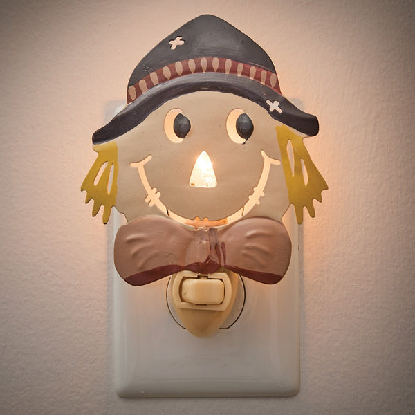 Primitive scarecrow plug-in night light with hand-painted harvest design by Park Designs.
