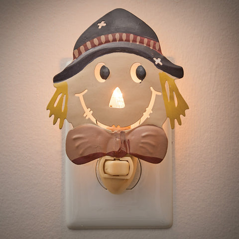 Primitive scarecrow plug-in night light with hand-painted harvest design by Park Designs.