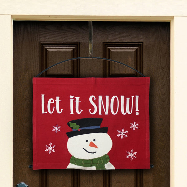 Primitive Christmas pennant featuring a smiling snowman with a black top hat, green scarf, embroidered snowflakes, and "Let it Snow!" on a red background.