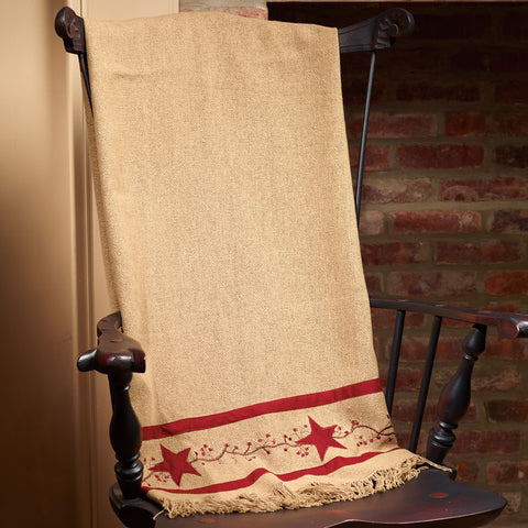 Primitive Star Vine Burlap Throw features a Pip Berry Vine with Stars on a khaki burlap background, finished with fringe.  Colors: Cranberry, Khaki