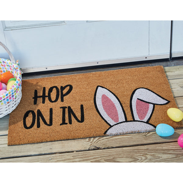 Our Hop on In Doormat features bunny ears with with the phrase, Hop on it...