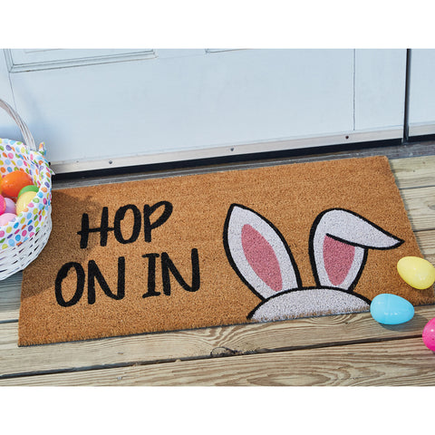 Our Hop on In Doormat features bunny ears with with the phrase, Hop on it...