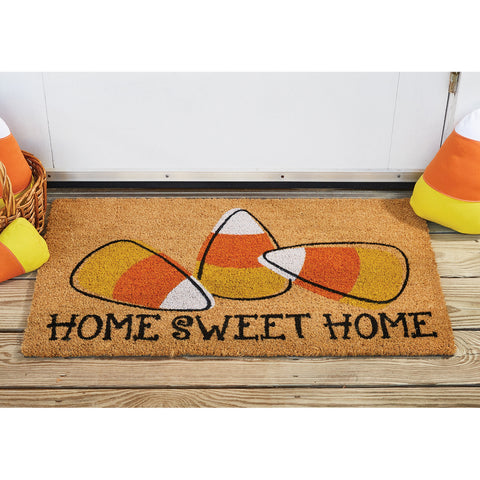 Our Candy Corn Doormat (set of 2) will liven up your entryway and add a sweet Halloween welcome to your home.  Featuring three large pieces of candy corn with the words Home Sweet Home.